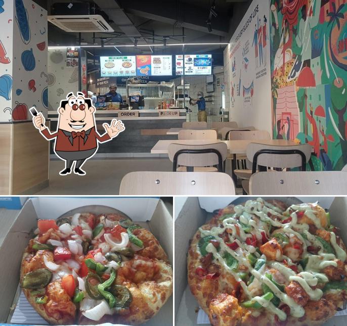 Among different things one can find food and interior at Domino's Pizza