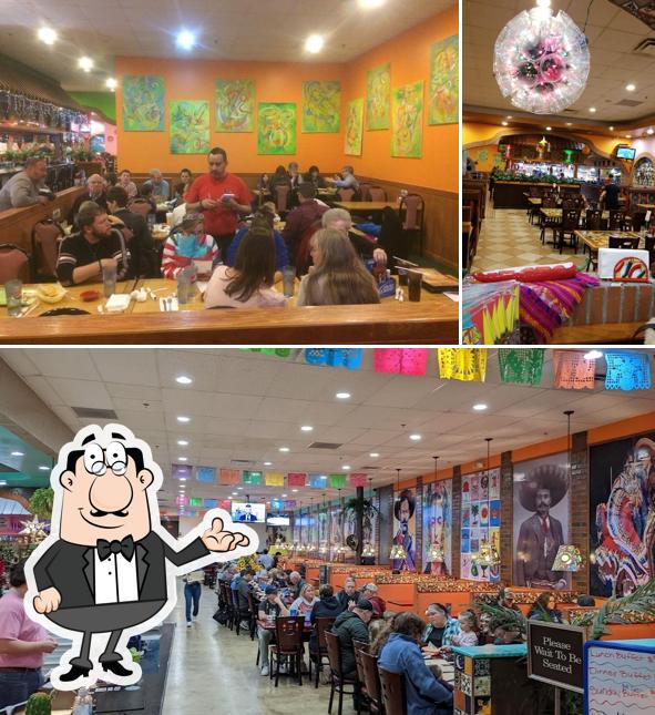 Check out the image displaying interior and beverage at Fiesta Mexicana (Coshocton Ave)