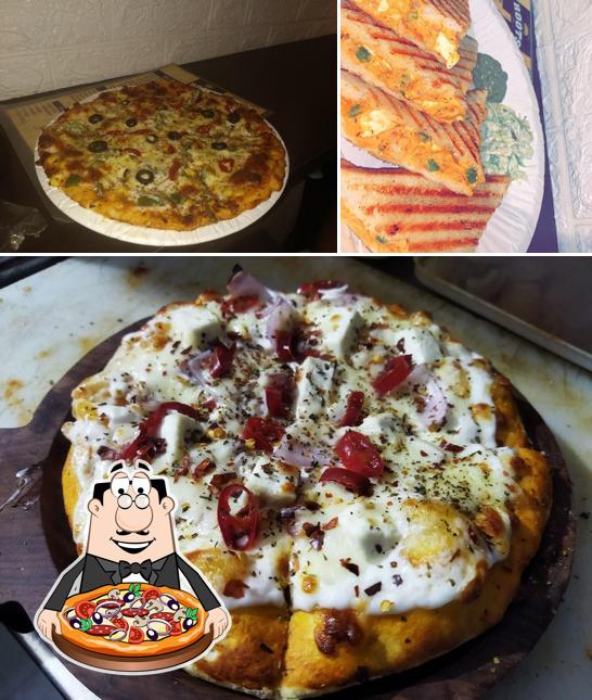 Order pizza at Roots Cafe- Best in Pizza,Momos,Burgers,wraps,shakes,Fries