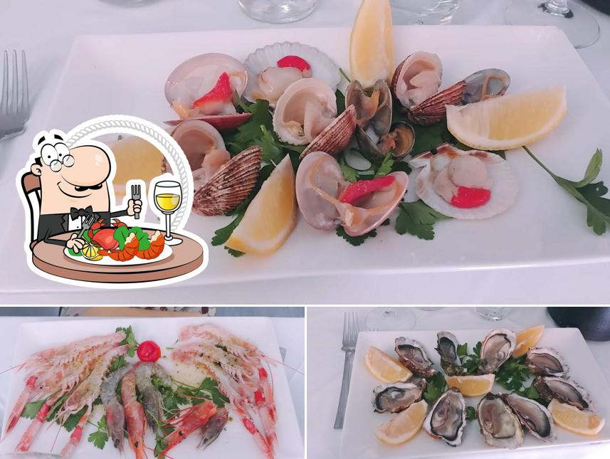 Ordina la cucina di mare a La Perla D'oro