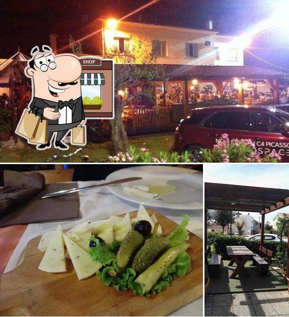 Goditi la vista dall'area esterna di KONOBA PIZZERIA BABIĆI