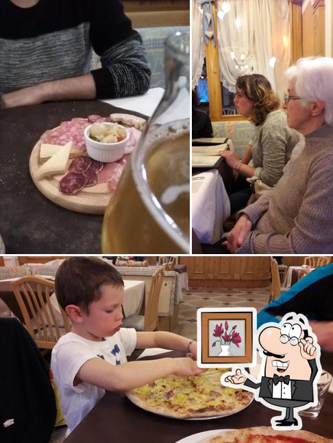 Siediti a un tavolo di Pizzeria Ristorante Majestic