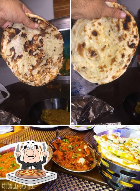 Try out pizza at Shahi Bawarchi Multi Cuisine Restaurant