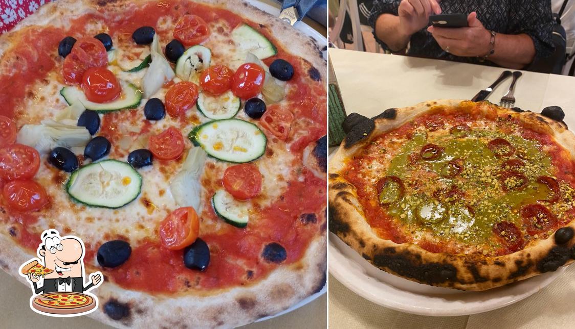 Prova una pizza a Ristorante Pizzeria Il Colombaio di Cipressina s.r.l