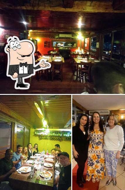 Veja imagens do interior do Pizzaria Cristiano