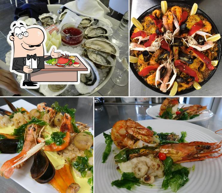 В "Restaurant Aux Embruns" вы можете попробовать различные блюда с морепродуктами