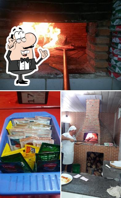 O interior do Pizzaria forno D' lenha