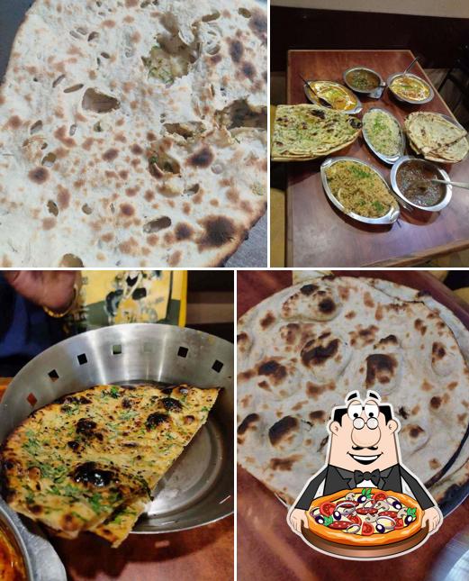 Pick pizza at Amar Jyoti Restaurant - Since 1965