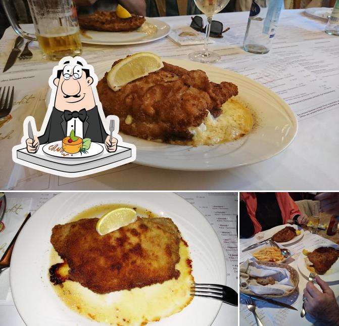 Questa è la foto che raffigura la cibo e tavolo da pranzo di Gleis 1