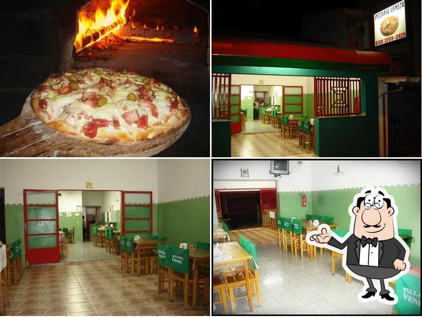 Entre diversos coisas, interior e comida podem ser encontrados a Pizzaria Veneza