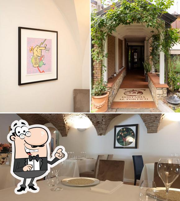 Dai un'occhiata agli interni di Hostaria Al Portico