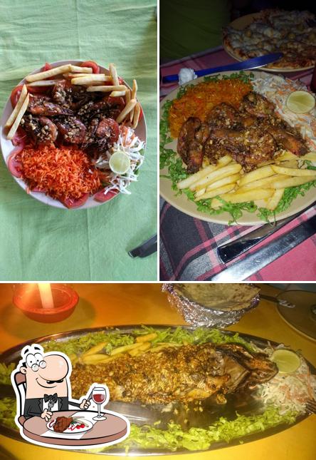 Get meat dishes at Green Apple Bar & Restaurant