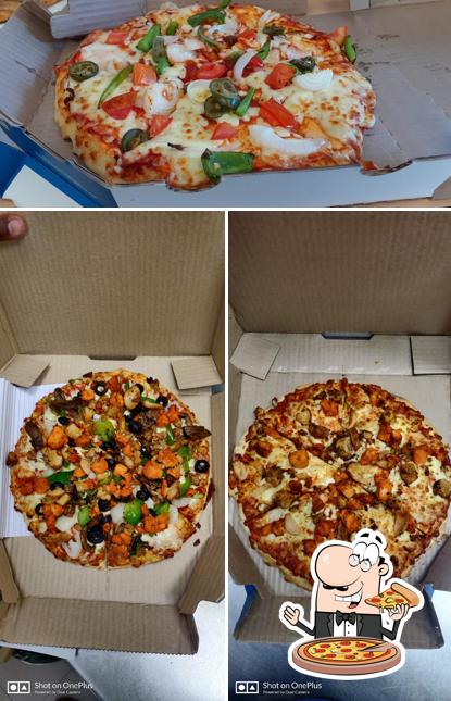 Try out pizza at Domino's Pizza