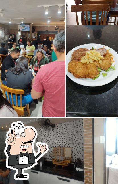 O interior do Restaurante Primeira Opçāo
