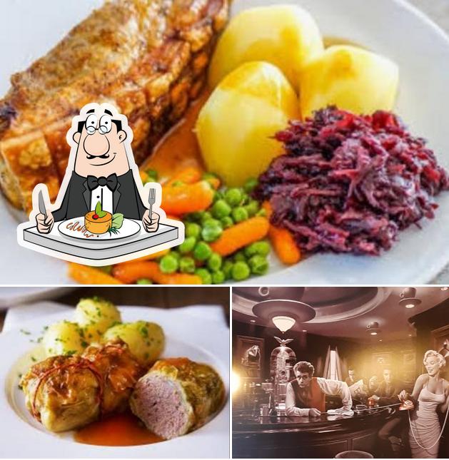 Parmi les diverses choses de la nourriture et la comptoir de bar, une personne peut trouver sur Restaurant - Der Balken