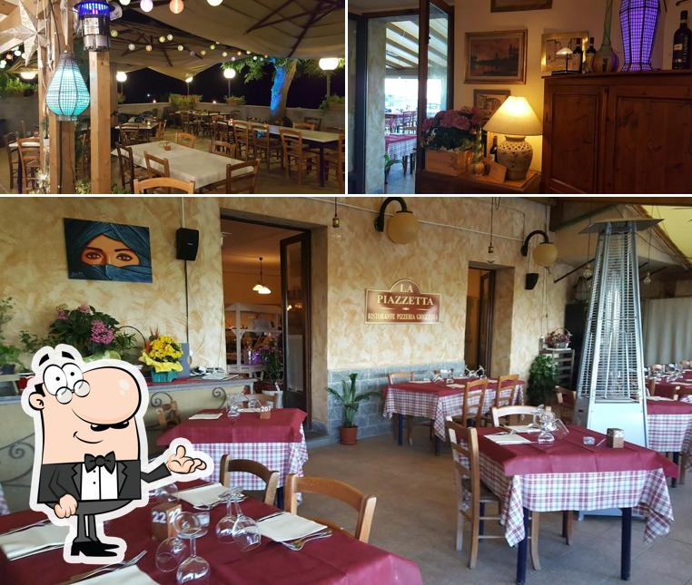 Siediti a un tavolo di La Piazzetta Ristorante Pizzeria Griglieria