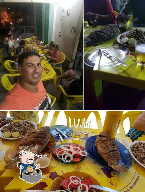Entre diversos coisas, comida e cerveja podem ser encontrados no Bar do Dió