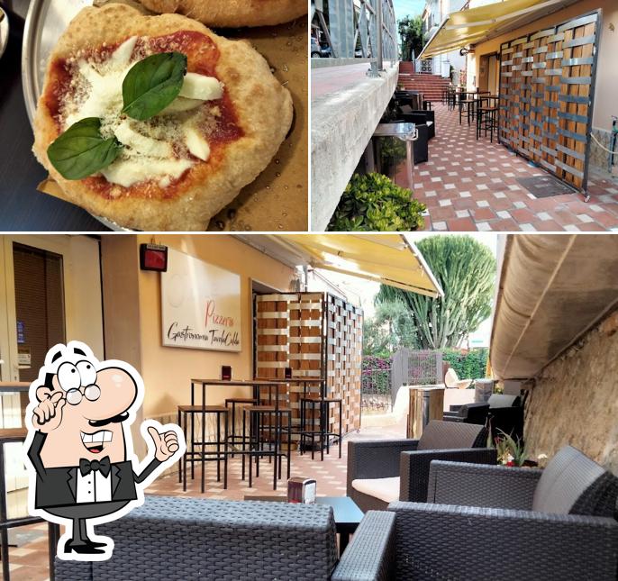 Pizzeria Óiné Gastronomia Tavola Calda d'asporto si caratterizza per la interni e cibo