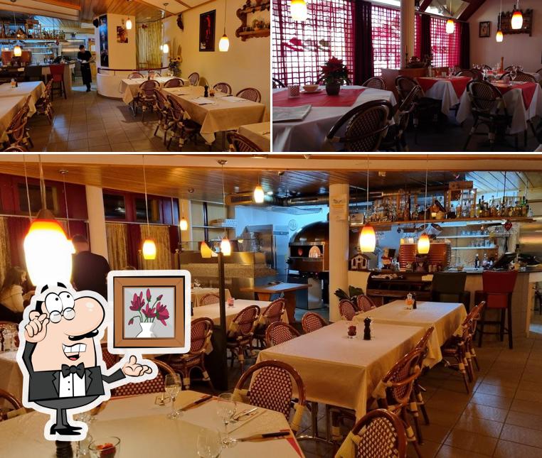 Siediti a un tavolo di Restaurant dacCapo