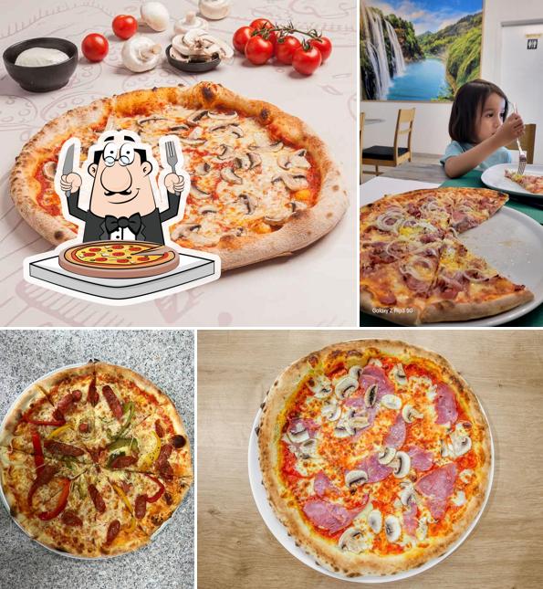 Try out pizza at Happy Pizzeria