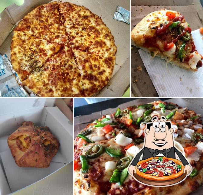 Try out pizza at Domino's Pizza Sehdev Market, Jalandhar