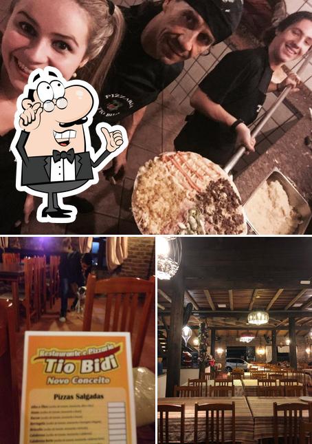 O Pizzaria Tio Bidi se destaca pelo interior e bolo