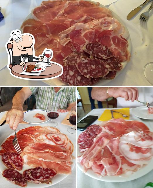 Prenditi i un pasto a base di carne a Trattoria Ai Doppi