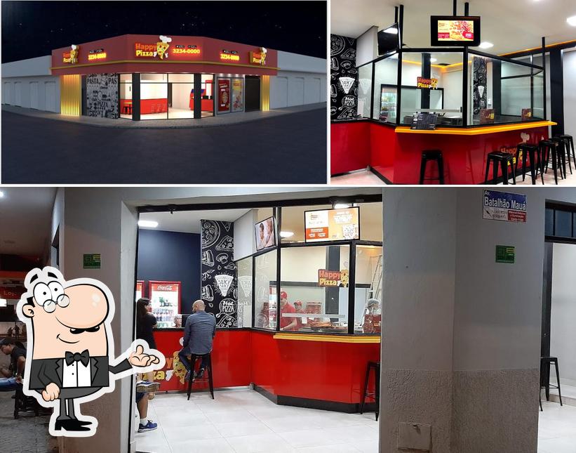 O interior do Happy Pizza Araguari