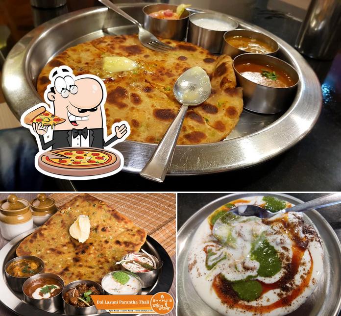 Order pizza at Shahji’s Parantha House(Lakshmi Road)