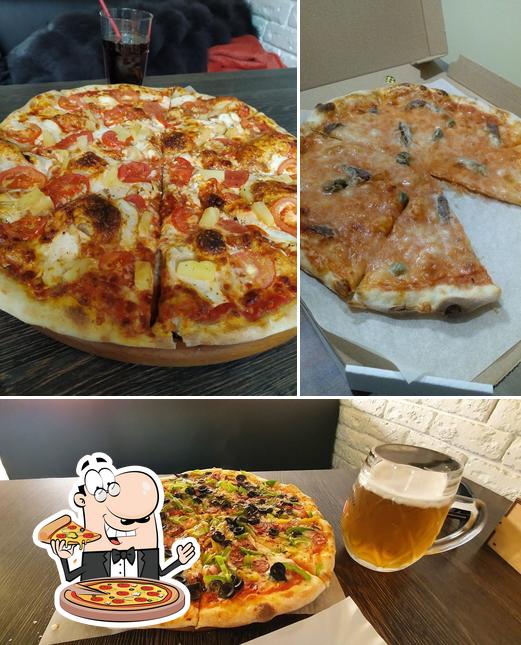 Prenez des pizzas à Pizza Mania