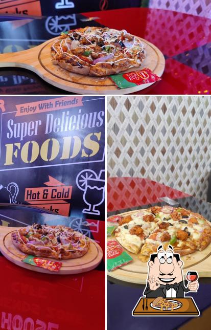 Order pizza at FRIENDS ZONE CAFE