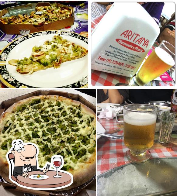 Check out the photo showing food and drink at Churrascaria e Pizzaria Aritana