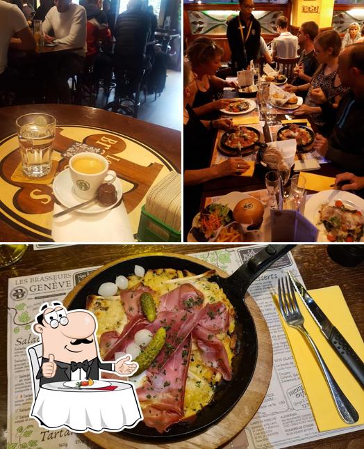 La foto della tavolo da pranzo e cibo di Les Brasseurs