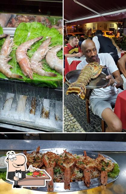 Попробуйте блюда с морепродуктами в "Restaurante Príncipe de Mônaco - (Copacabana)"
