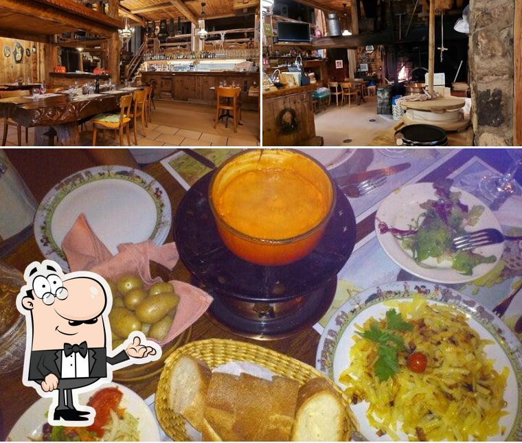 La immagine di interni e cibo da Restaurant la Fromagerie
