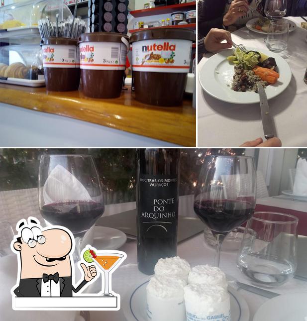Las imágenes de bebida y comedor en Restaurante O Beirão