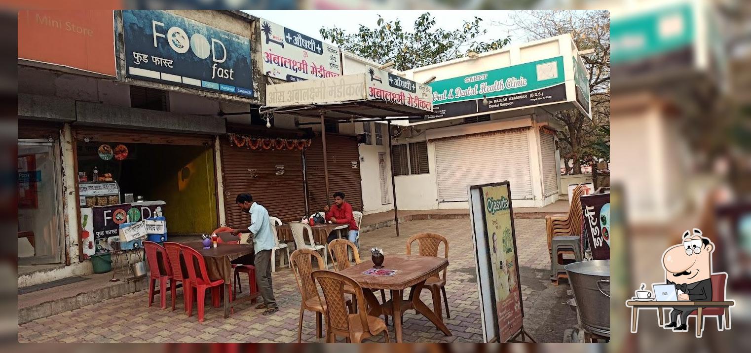 Take a seat at one of the tables at Food Fast
