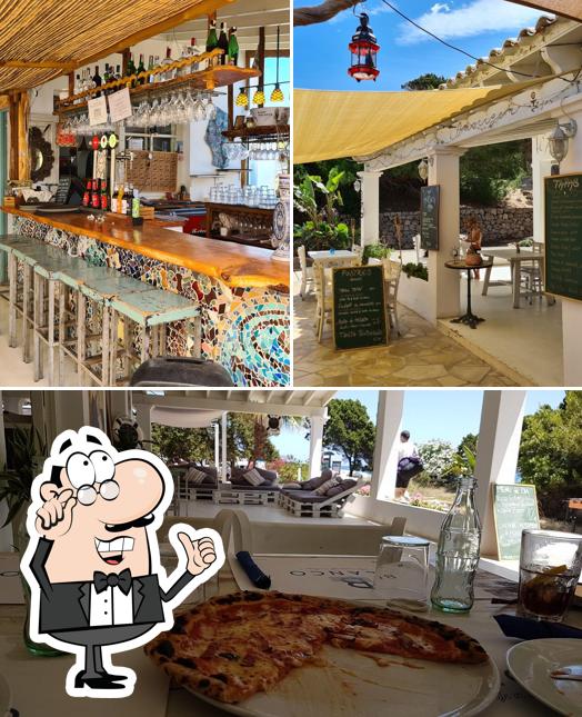 Check out the image showing interior and food at Blanco - Cala Nova - Ibiza Restaurant