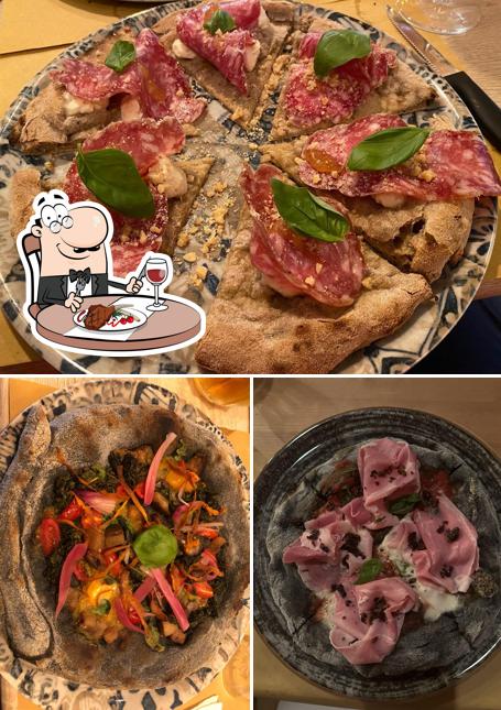 Prenditi i piatti di carne a Dado Pizzeria Gourmet