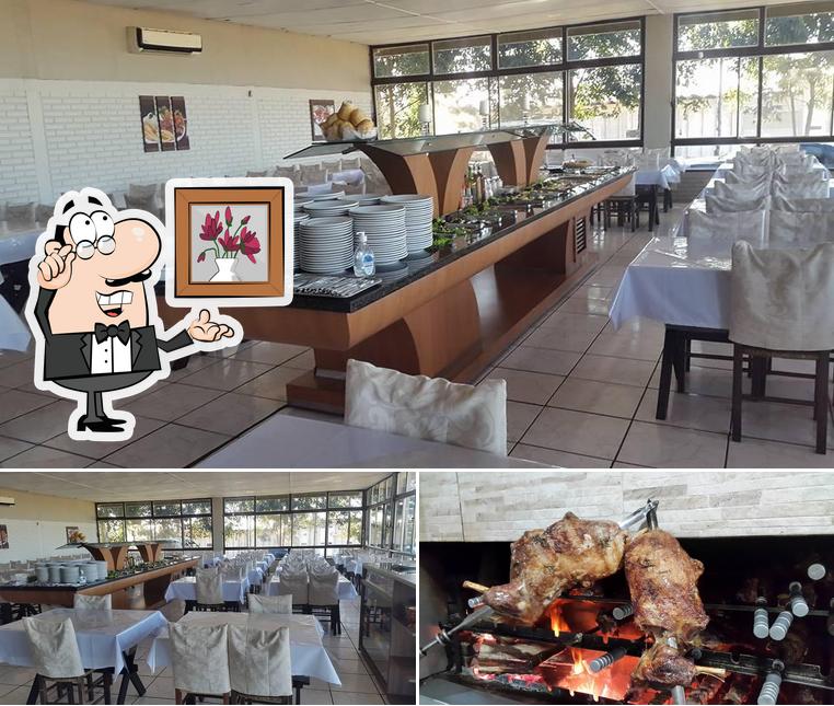 Dê uma olhada a imagem apresentando interior e frutos do mar a Churrascaria Espeto de Prata