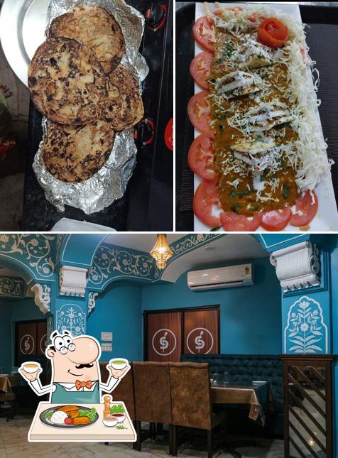 Among various things one can find food and interior at Pangat Restaurant Hotel Shikhar Palace