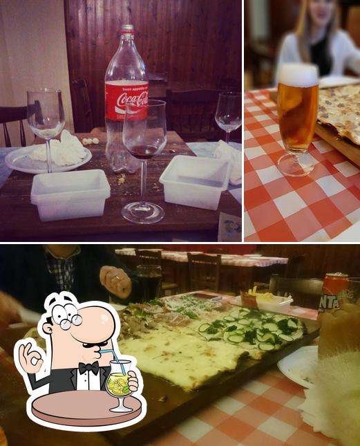 Tra le diverse cose da Pizzeria King si possono trovare la bevanda e pizza