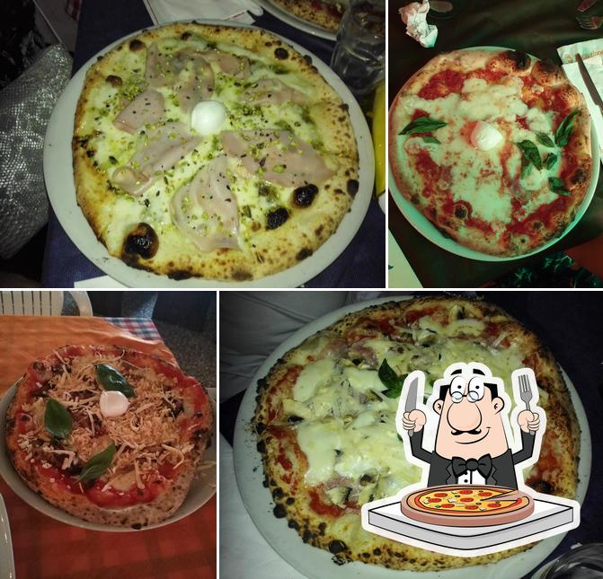 A Pizzeria Napoletana Lo Scugnizzo, vous pouvez essayer des pizzas