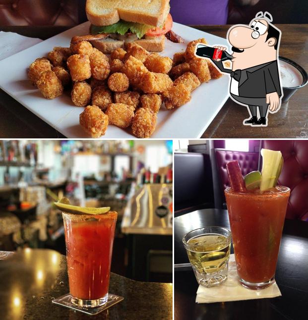 The photo of drink and food at Ray J's American Grill