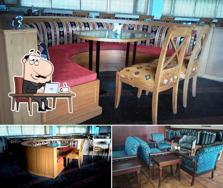 Take a seat at one of the tables at CGA GOLF RANGE