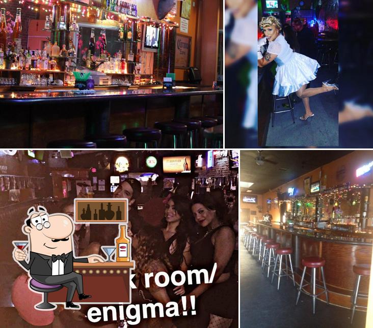 This is the photo showing bar counter and interior at Enigma Bar