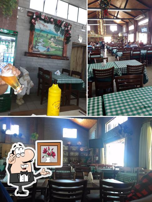 Sente em uma das mesas no O Caipira - Restaurante