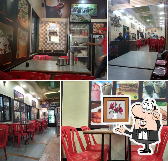 Take a seat at one of the tables at Gargi Dining Hall Kharadi