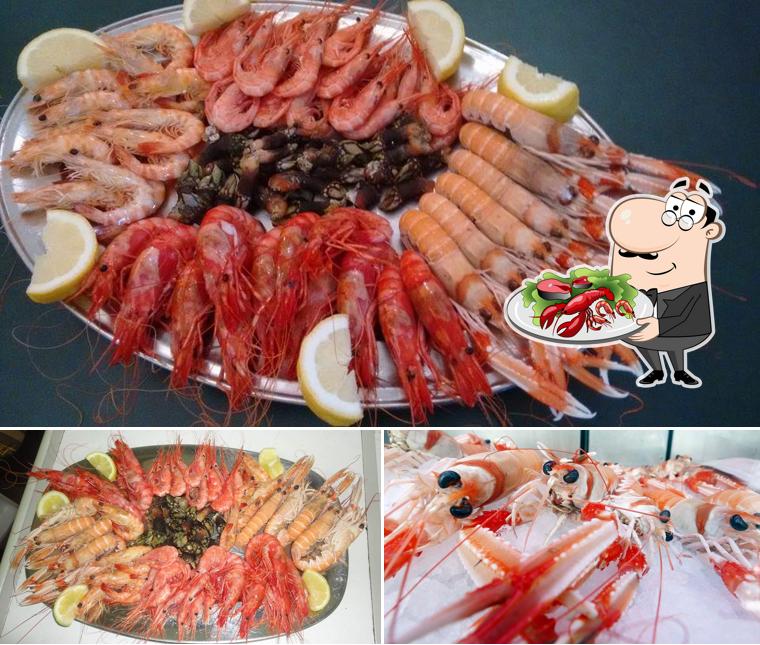 Попробуйте блюда с морепродуктами в "Restaurante Marisqueria Santa Cruz"