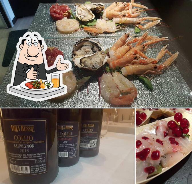 Questa è la foto che mostra la cibo e birra di Ex QuantuMestre Risto